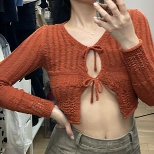 cropped orange bow tie cardigan sweater